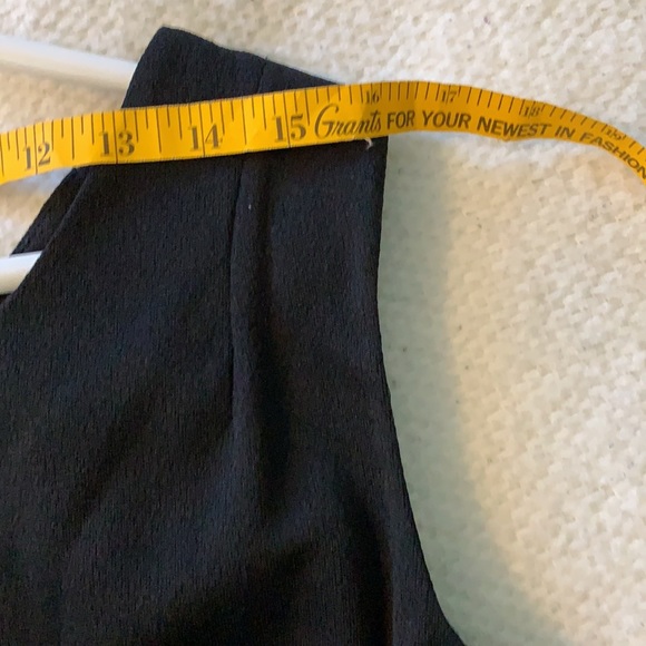 Simple black gown with embellished center. - Picture 7 of 7